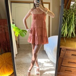 Liberty Love Floral babydoll dress 
Light pink/orange with white flowers